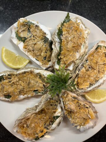 Prop baked oysters, commissioned for a theatre show Plate of prop baked oysters