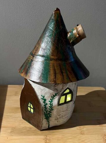 Fairy House, built from clay with battery-operated lights. Made as a gift.